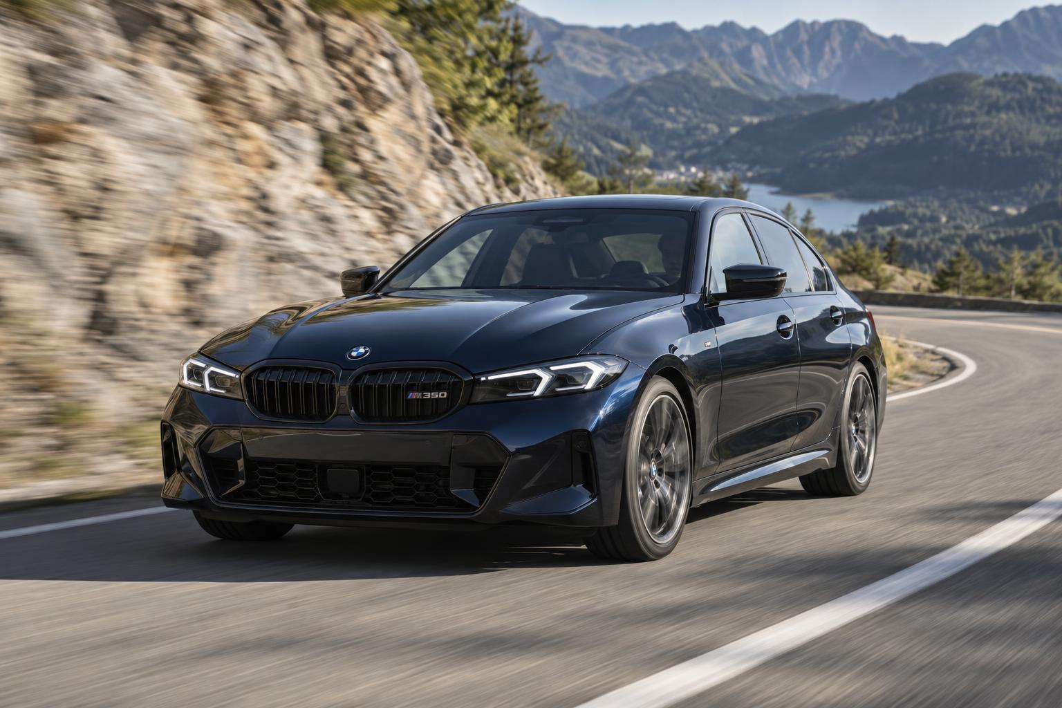 BMW M350 xDrive driving through a dry mountain-road bend from a front three-quarter view.