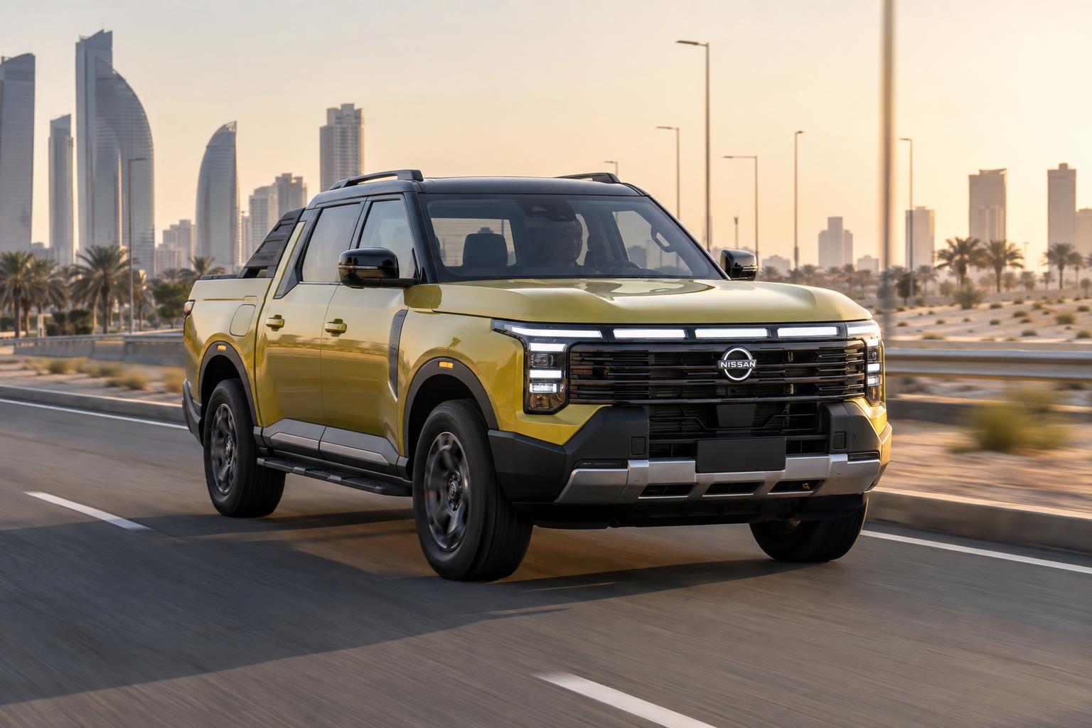 Nissan Frontier Pro pickup driving on a modern Gulf highway.