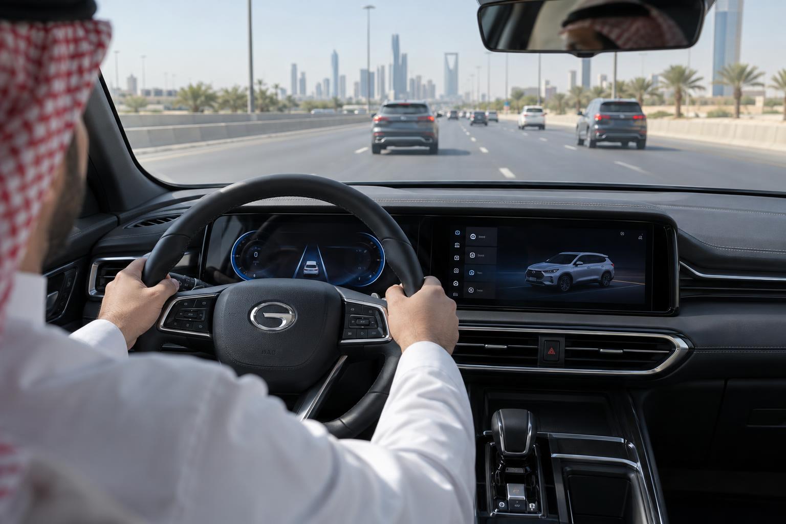 View from inside a GAC GS4 driving steadily on a marked Saudi motorway.