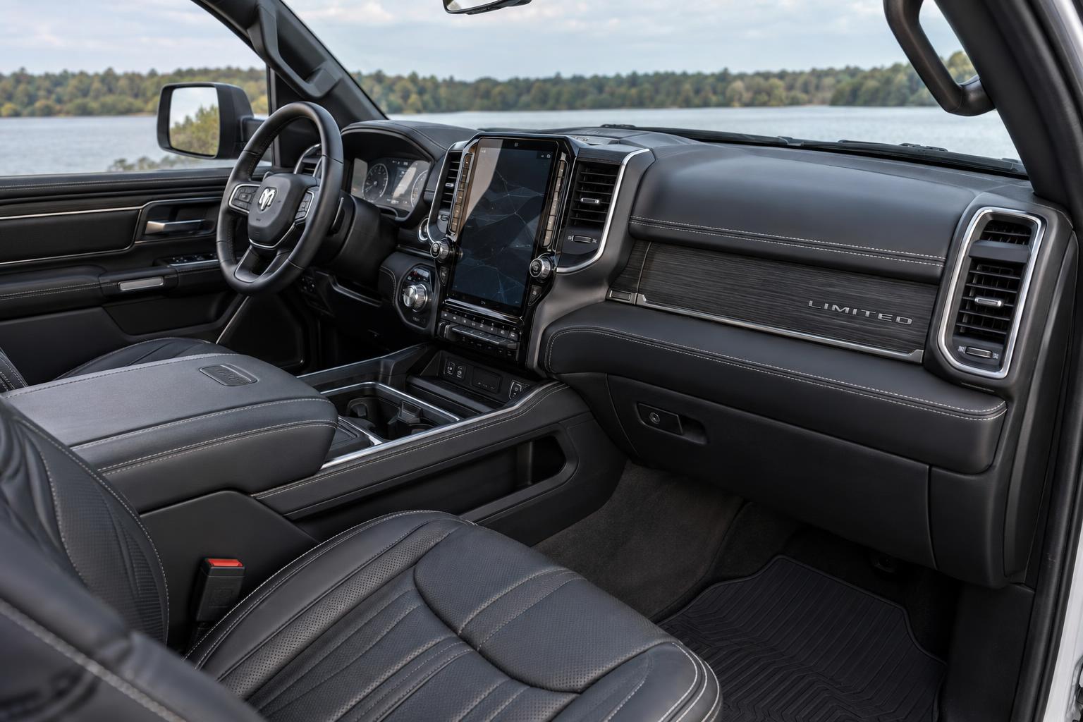 Front cabin of a 2026 Ram 1500 Limited showing its dashboard, console and premium seating.
