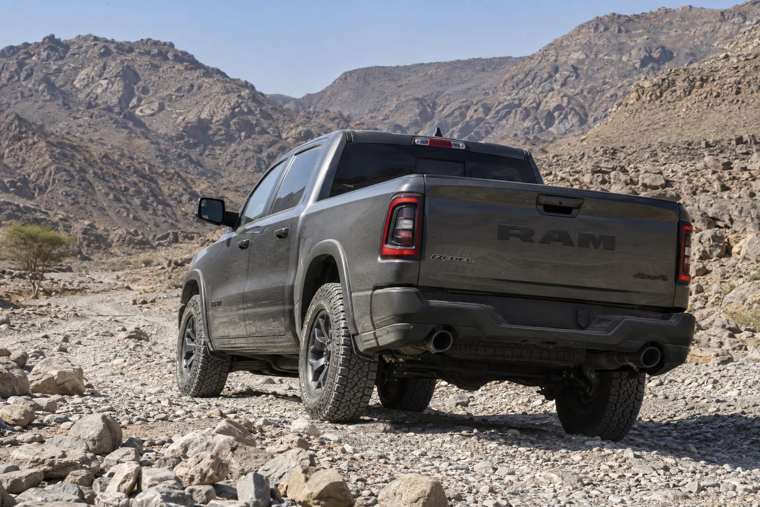 2026 Ram 1500 Rebel travelling on a rocky wadi track in the Gulf.
