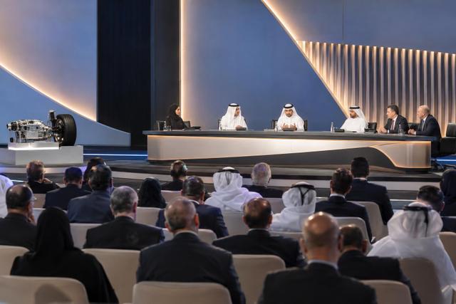 Officials and industrial delegates attend a plenary discussion at a Bahrain manufacturing forum.