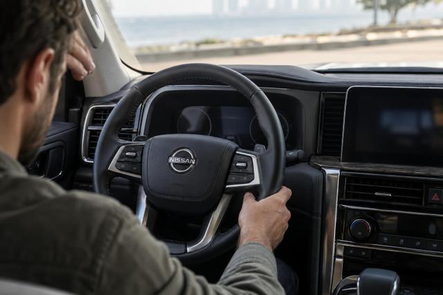 The driver area of a parked Nissan Patrol Y63, shown in the context of a potential loss-of-drive-power fault.
